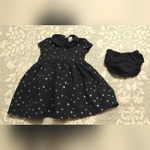 Carters 12 month navy blue baby dress with gold medallion details all over.